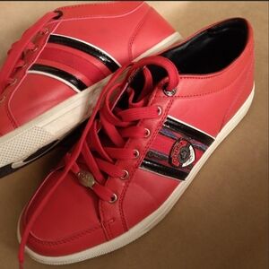 Red Coogi sneakers. Great condition with very little wear in a men's size 10.5.